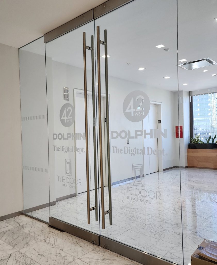 Frosted logo door branding on an office glass door in Nairobi